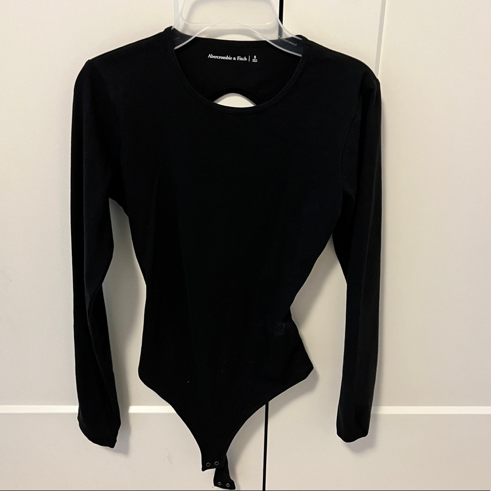 NWOT black bodysuit with cutout back